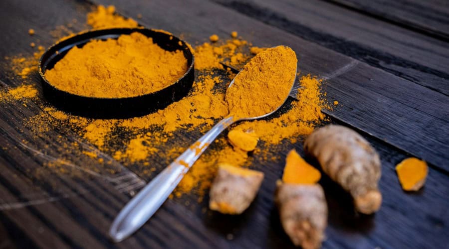 Spoon with Turmeric Powder